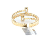New 0.80ctw Baguette and Round Diamond Bypass Ring in 14K