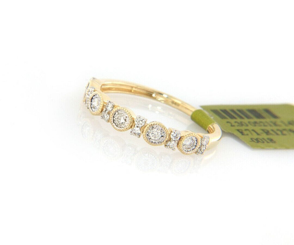 New 0.28ctw Diamond Bezel and Prong Set Band Ring in 14K