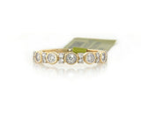 New 0.28ctw Diamond Bezel and Prong Set Band Ring in 14K