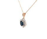 1.10ct Oval Sapphire and 0.30ctw Diamond Starburst Pendant Necklace in 14K